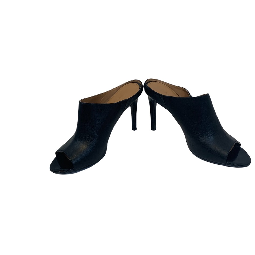 - Calvin Klein slip on leather heals.